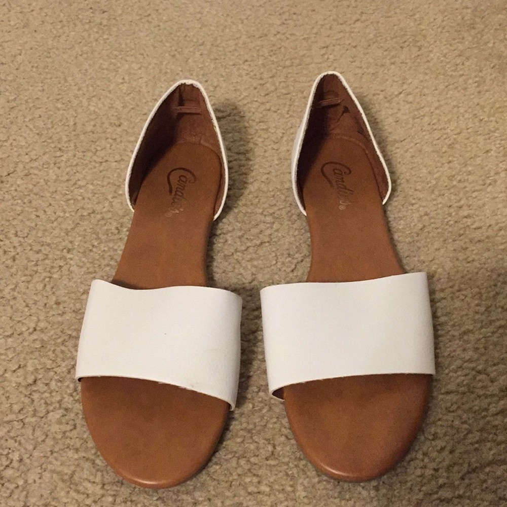 White and tan sandal